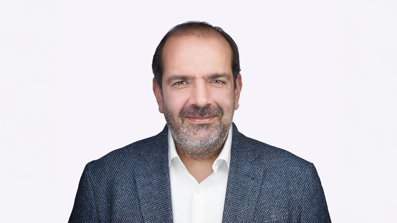 Professional headshot of Roy Papatheodorou, EVP General Counsel